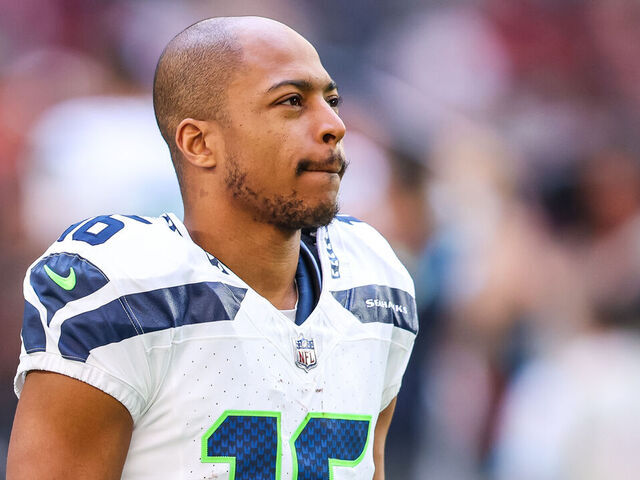 GLENDALE, ARIZONA - DECEMBER 8: Tyler Lockett #16 of the Seattle Seahawks on the field before a game against the Arizona Cardinals at State Farm Stadium on December 8, 2024 in Glendale, Arizona.