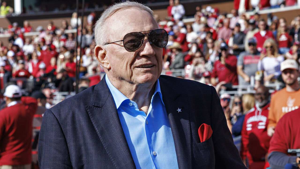 FAYETTEVILLE, ARKANSAS - NOVEMBER 16: Dallas Cowboys owner and Razorback Alumni Jerry Jones on the field during a game between the Texas Longhorns and the Arkansas Razorbacks at Donald W. Reynolds Razorback Stadium on November 16, 2024 in Fayetteville, Arkansas. The Longhorns defeated the Razorbacks 20-10.