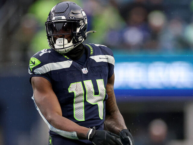 SEATTLE, WASHINGTON - DECEMBER 22: DK Metcalf #14 of the Seattle Seahawks looks on against the Minnesota Vikings at Lumen Field on December 22, 2024 in Seattle, Washington.