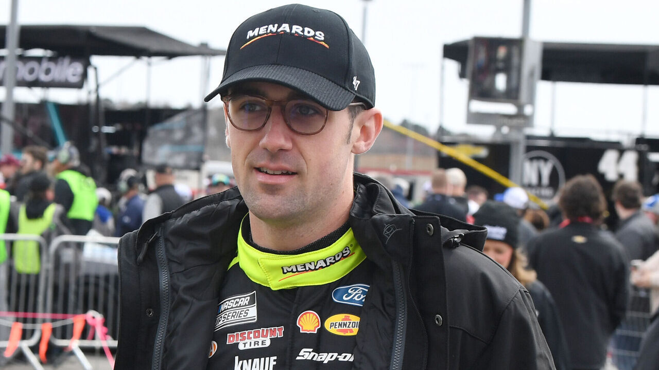 ATLANTA, GA - FEBRUARY 23: Austin Cindric (#2 Team Penske Menards/Delta Ford) looks on prior to the running of the NASCAR Cup Series Ambetter Health 400 on February 23, 2025, at Atlanta Motor Speedway in Hampton, GA.