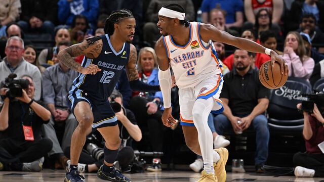 MEMPHIS, TN - MARCH 5: Ja Morant #12 of the Memphis Grizzlies defends Shai Gilgeous-Alexander #2 of the Oklahoma City Thunder during the game on March 5, 2025 at FedExForum in Memphis, Tennessee. Mandatory Copyright Notice: Copyright 2025 NBAE