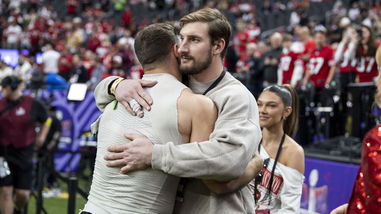 LAS VEGAS, NEVADA - FEBRUARY 11: Nick Bosa #97 of the San Francisco 49ers hugs his brother, Joey Bosa, prior to the NFL Super Bowl 58 football game between the San Francisco 49ers and the Kansas City Chiefs at Allegiant Stadium on February 11, 2024 in Las Vegas, Nevada.