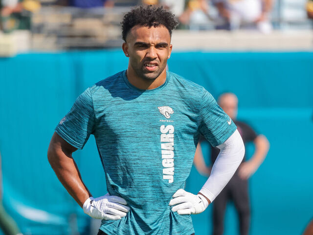 JACKSONVILLE, FLORIDA - OCTOBER 27: Christian Kirk #13 of the Jacksonville Jaguars warms up prior to the game against the Green Bay Packers at EverBank Field on October 27, 2024 in Jacksonville, Florida.