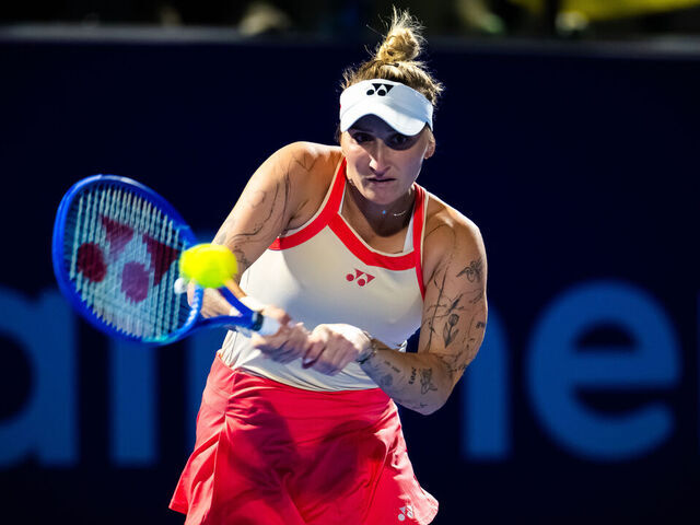 DOHA, QATAR - FEBRUARY 10: Marketa Vondrousova of the Czech Republic in action against Elina Svitolina of Ukraine in the first round on Day Two of the Qatar TotalEnergies Open, part of the Hologic WTA Tour at Khalifa International Tennis and Squash Complex on February 10, 2025 in Doha, Qatar