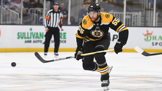 BOSTON, MASSACHUSETTS - FEBRUARY 1: Justin Brazeau #55 of the Boston Bruins skates after the puck against the New York Rangers on February 1, 2025, at the TD Garden in Boston, Massachusetts.