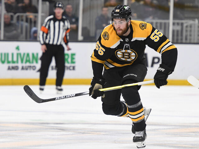 BOSTON, MASSACHUSETTS - FEBRUARY 1: Justin Brazeau #55 of the Boston Bruins skates after the puck against the New York Rangers on February 1, 2025, at the TD Garden in Boston, Massachusetts.