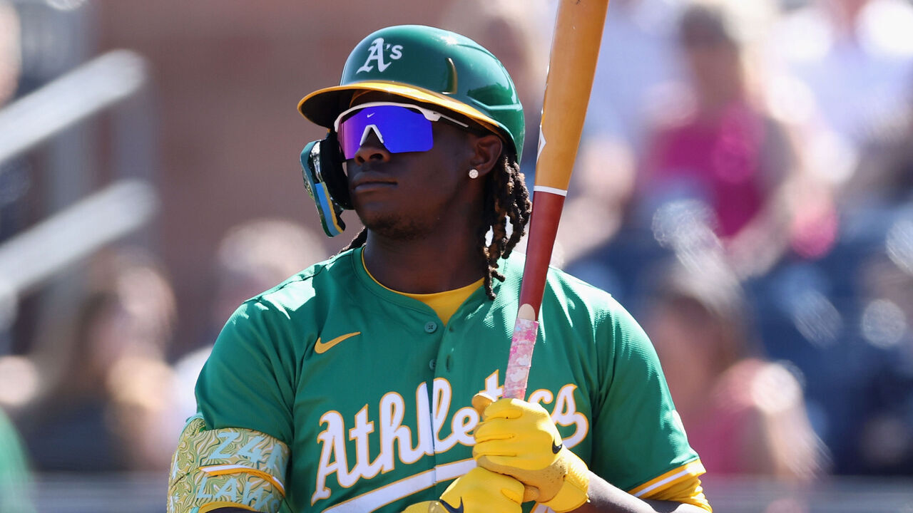 PEORIA, ARIZONA - FEBRUARY 26: Lawrence Butler #4 of the Athletics bats against the Seattle Mariners during the first inning of the MLB game at Peoria Stadium on February 26, 2025 in Peoria, Arizona.
