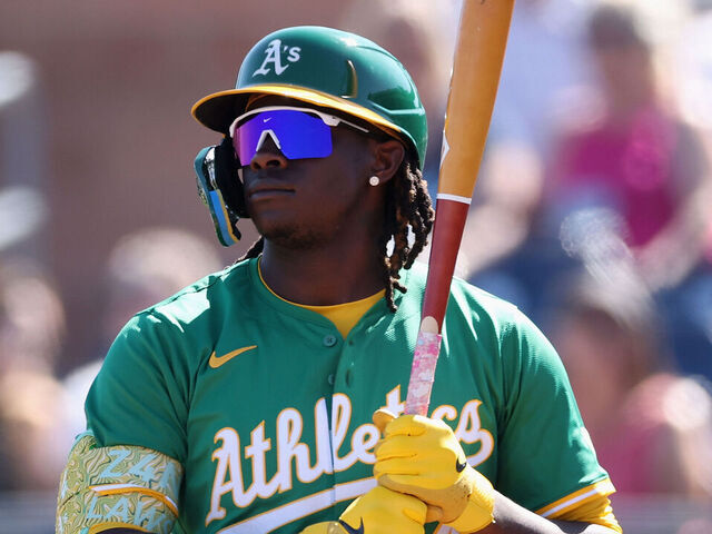 PEORIA, ARIZONA - FEBRUARY 26: Lawrence Butler #4 of the Athletics bats against the Seattle Mariners during the first inning of the MLB game at Peoria Stadium on February 26, 2025 in Peoria, Arizona.