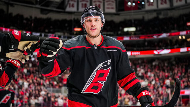 RALEIGH, NORTH CAROLINA - JANUARY 30: Mikko Rantanen #96 of the Carolina Hurricanes celebrates with teammates after a goal during the second period against the Chicago Blackhawks at Lenovo Center on January 30, 2025 in Raleigh, North Carolina.