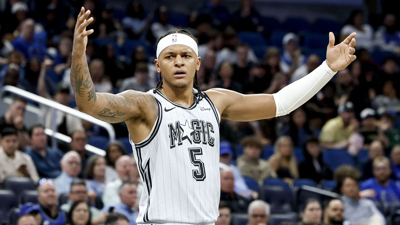 ORLANDO, FL - MARCH 4: Paolo Banchero #5 of the Orlando Magic disagrees with a call during the first half of the game against the Toronto Raptors at the Kia Center on March 4, 2025 in Orlando, Florida. The Raptors defeated the Magic 114 to 113.