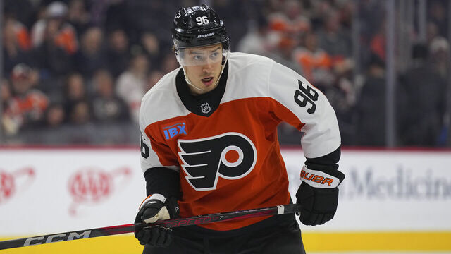 PHILADELPHIA, PENNSYLVANIA - MARCH 4: Andrei Kuzmenko #96 of the Philadelphia Flyers looks on against the Calgary Flames at the Wells Fargo Center on March 4, 2025 in Philadelphia, Pennsylvania. The Flames defeated the Flyers 6-3.