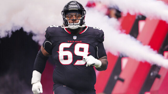HOUSTON, TX - DECEMBER 15: Shaq Mason #69 of the Houston Texans runs out of the tunnel prior to an NFL football game against the Miami Dolphins at NRG Stadium on December 15, 2024 in Houston, Texas.