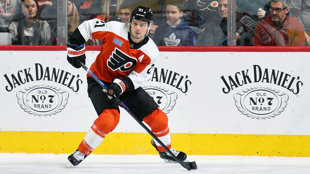 PHILADELPHIA, PENNSYLVANIA - JANUARY 07: Scott Laughton #21 of the Philadelphia Flyers skates the puck against the Toronto Maple Leafs at the Wells Fargo Center on January 7, 2025 in Philadelphia, Pennsylvania.