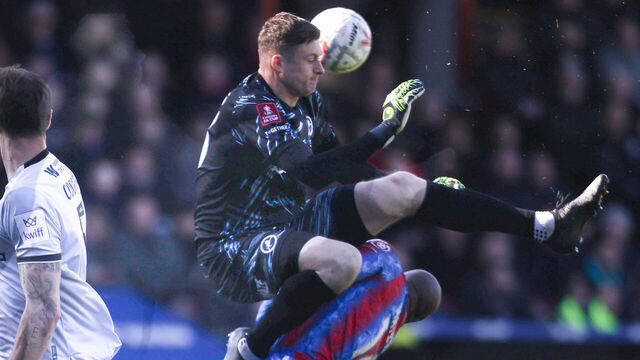 LONDON, ENGLAND - MARCH 1: Millwall's Liam Roberts fouls Crystal Palace's Jean-Philippe Mateta which resulted in him receiving a recd card during the Emirates FA Cup Fifth Round match between Crystal Palace and Millwall at Selhurst Park on March 1, 2025 in London, England.