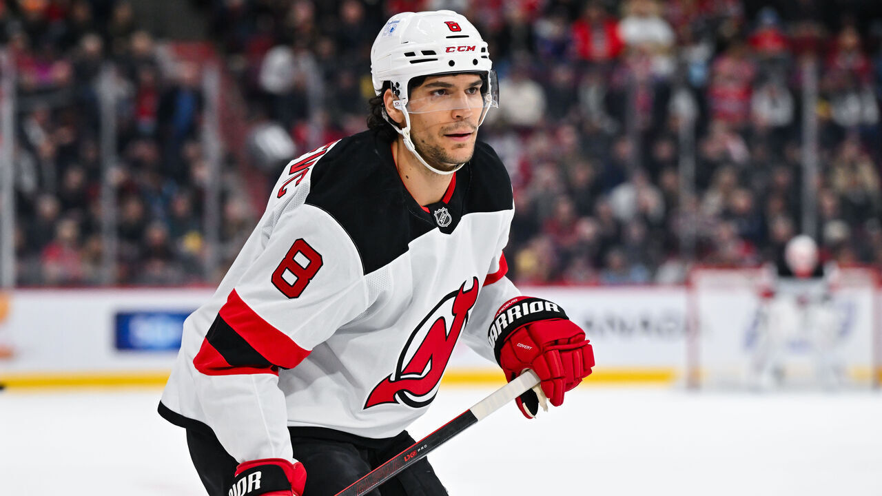 MONTREAL, CANADA - JANUARY 25: Johnathan Kovacevic #8 of the New Jersey Devils skates during the first period against the Montreal Canadiens at the Bell Centre on January 25, 2025 in Montreal, Quebec, Canada. The New Jersey Devils defeated the Montreal Canadiens 4-3 in overtime.