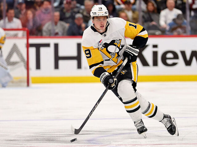 DENVER, COLORADO - MARCH 4: Cody Glass #19 of the Pittsburgh Penguins skates down ice against the Colorado Avalanche at Ball Arena on March 4, 2025 in Denver, Colorado.