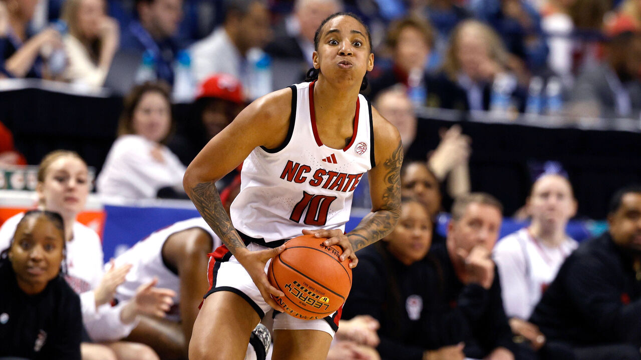 GREENSBORO, NORTH CAROLINA - MARCH 7: Aziaha James #10 of the NC State Wolfpack looks to pass up court during the first half against the Georgia Tech Yellow Jackets in a quarterfinals game of the ACC women's basketball tournament at First Horizon Coliseum on March 7, 2025 in Greensboro, North Carolina.