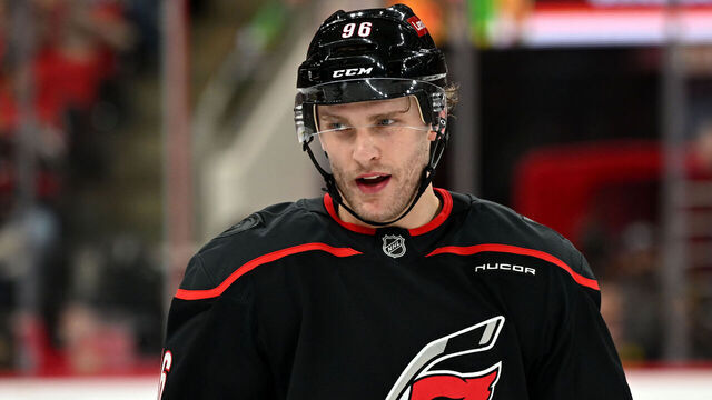 RALEIGH, NC - JANUARY 30: Carolina Hurricanes right wing Mikko Rantanen (96) talks to a teammate during a television timeout during the NHL game between the Chicago Blackhawks and the Carolina Hurricanes on January 30, 2025 at Lenovo Center in Raleigh, North Carolina.