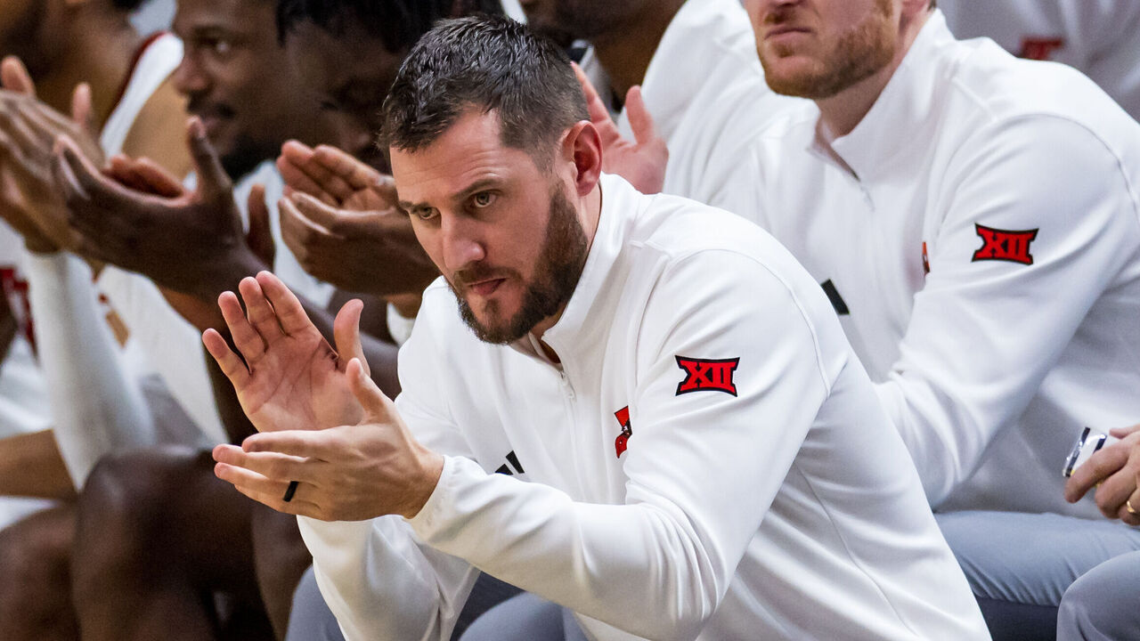 LUBBOCK, TEXAS - JANUARY 11: Assistant coach Matt Braeuer of the Texas Tech Red Raiders claps during the second half of the game against the Iowa State Cyclones at United Supermarkets Arena on January 11, 2025 in Lubbock, Texas.