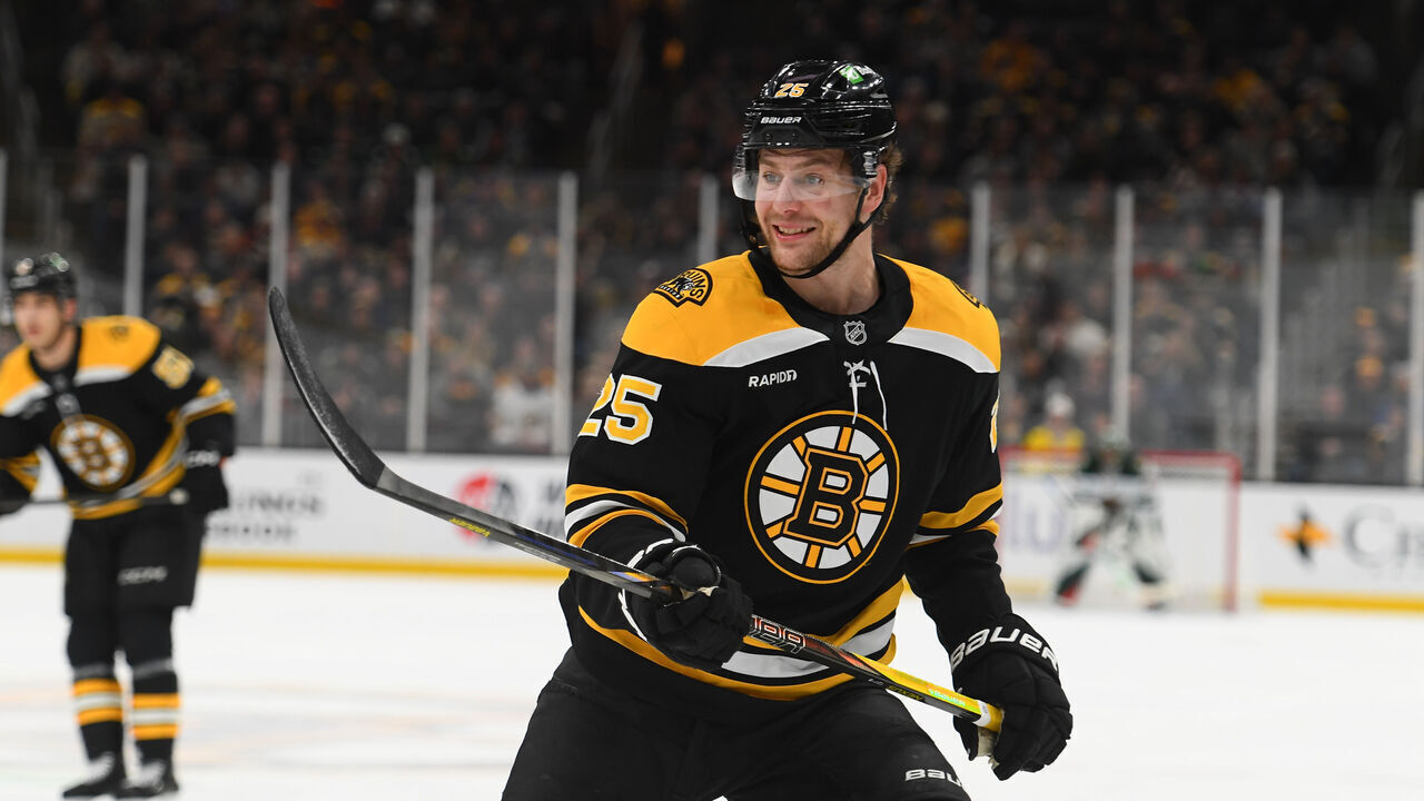 BOSTON, MASSACHUSETTS - FEBRUARY 4: Brandon Carlo #25 of the Boston Bruins skates against the Minnesota Wild on February 4, 2025, at the TD Garden in Boston, Massachusetts.