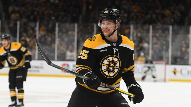 BOSTON, MASSACHUSETTS - FEBRUARY 4: Brandon Carlo #25 of the Boston Bruins skates against the Minnesota Wild on February 4, 2025, at the TD Garden in Boston, Massachusetts.