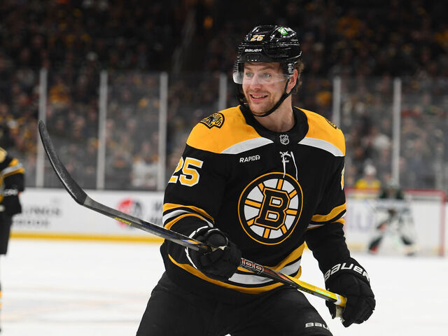 BOSTON, MASSACHUSETTS - FEBRUARY 4: Brandon Carlo #25 of the Boston Bruins skates against the Minnesota Wild on February 4, 2025, at the TD Garden in Boston, Massachusetts.