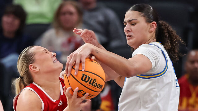 INDIANAPOLIS, INDIANA - MARCH 07: Alexis Markowski #40 of the Nebraska Cornhuskers has the ball blocked by Lauren Betts #51 of the UCLA Bruins during the second half in the Big Ten Women's Basketball Tournament quarterfinals at Gainbridge Fieldhouse on March 7, 2025 in Indianapolis, Indiana.