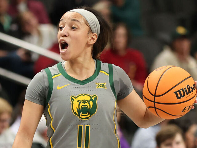 KANSAS CITY, MO - MARCH 08: Baylor Lady Bears guard Jada Walker (11) calls out a play in the first quarter of a women's Big 12 tournament quarterfinal game between the Iowa State Cyclones and Baylor Lady Bears on March 7, 2025 at T-Mobile Center in Kansas City, MO.