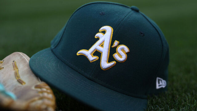 SEATTLE, WASHINGTON - SEPTEMBER 27: A general view of an Oakland Athletics logo and hat before the game against the Seattle Mariners at T-Mobile Park on September 27, 2024 in Seattle, Washington.