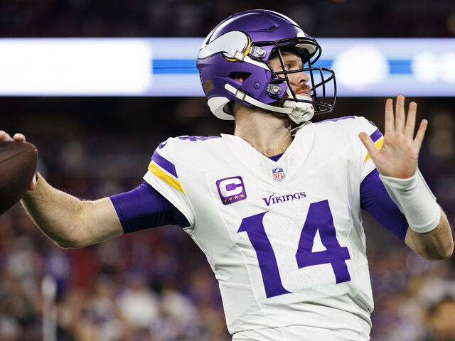 GLENDALE, ARIZONA - JANUARY 13: Quarterback Sam Darnold #14 of the Minnesota Vikings warms up prior to an NFC Wild Card game against the Los Angeles Rams, at State Farm Stadium on January 13, 2025 in Glendale, Arizona.