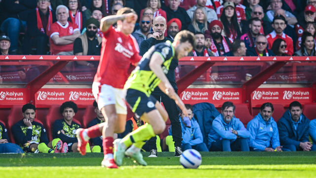 NOTTINGHAM, ENGLAND - MARCH 08: Manchester City manager Pep Guardiola looks on during the Premier League match between Nottingham Forest FC and Manchester City FC at City Ground on March 08, 2025 in Nottingham, England.