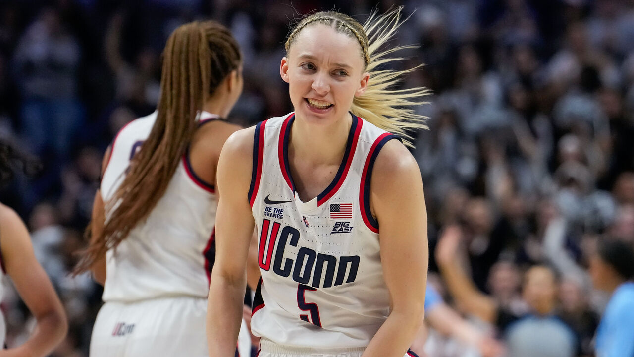 STORRS, CONNECTICUT - MARCH 2: Paige Bueckers #5 of the Connecticut Huskies reacts during the first half of an NCAA women's basketball game against the Marquette Golden Eagles at the Harry A. Gampel Pavilion on March 2, 2025 in Storrs, Connecticut.