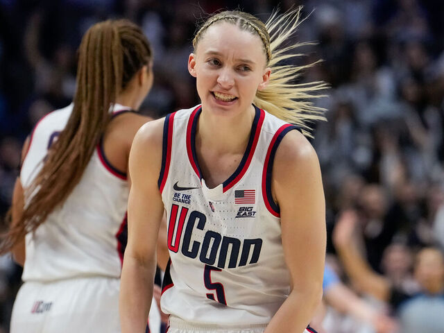STORRS, CONNECTICUT - MARCH 2: Paige Bueckers #5 of the Connecticut Huskies reacts during the first half of an NCAA women's basketball game against the Marquette Golden Eagles at the Harry A. Gampel Pavilion on March 2, 2025 in Storrs, Connecticut.