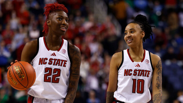 GREENSBORO, NORTH CAROLINA - MARCH 8: Saniya Rivers #22 and Aziaha James #10 of the NC State Wolfpack celebrate as time expires against the North Carolina Tar Heels in a semifinal game of the ACC women's basketball tournament at First Horizon Coliseum on March 8, 2025 in Greensboro, North Carolina.