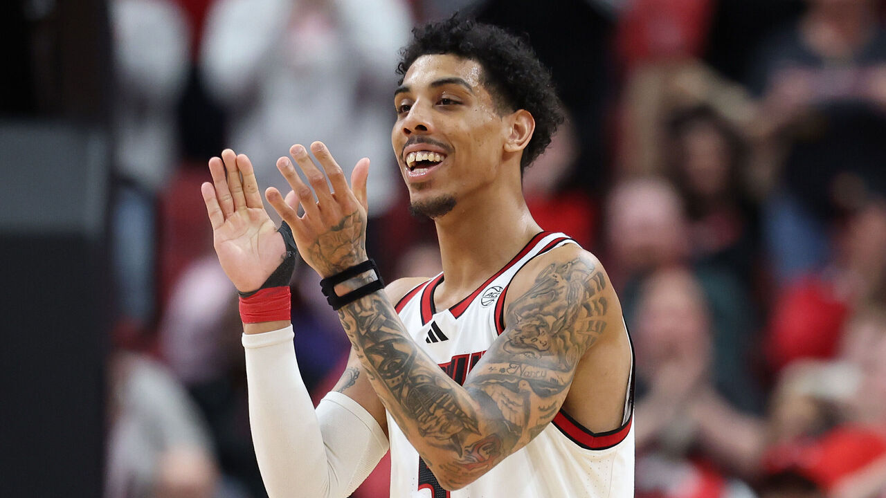 LOUISVILLE, KENTUCKY - MARCH 05: Terrence Edwards Jr #5 of the Louisville Cardinals celebrates in the game against the California Golden Bears at KFC YUM! Center on March 05, 2025 in Louisville, Kentucky.