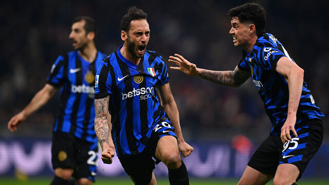 MILAN, ITALY - MARCH 08: Hakan Calhanoglu of FC Internazionale celebrates after scoring their team's second goal during the Serie match between Inter and Monza at Stadio Giuseppe Meazza on March 08, 2025 in Milan, Italy.