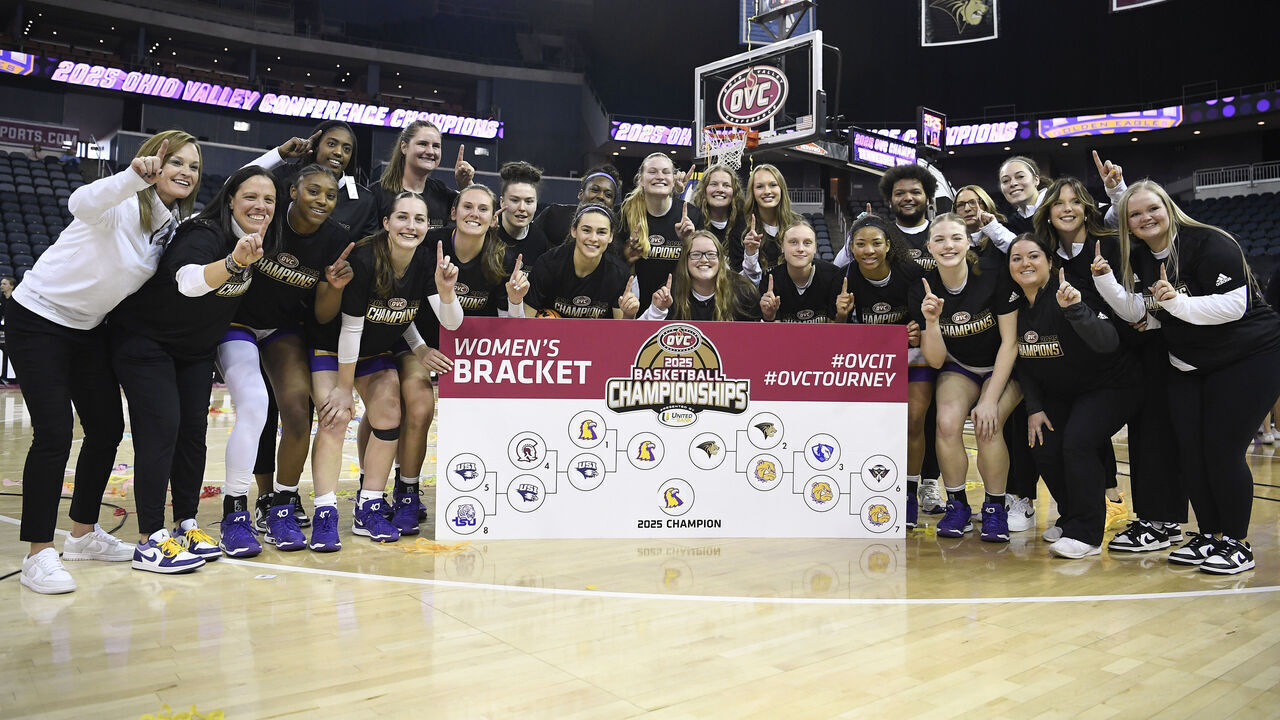 EVANSVILLE, IN - MARCH 08: The Tennessee Tech Golden Eagles pose for a photo after sticking their logo on the 2025 Champion circle on the OVC bracket after winning the Ohio Valley Conference Women's Basketball Tournament championship game between the Tennessee Tech Golden Eagles and the Lindenwood Lions on March 8, 2025, at the Ford Center in Evansville, Indiana.