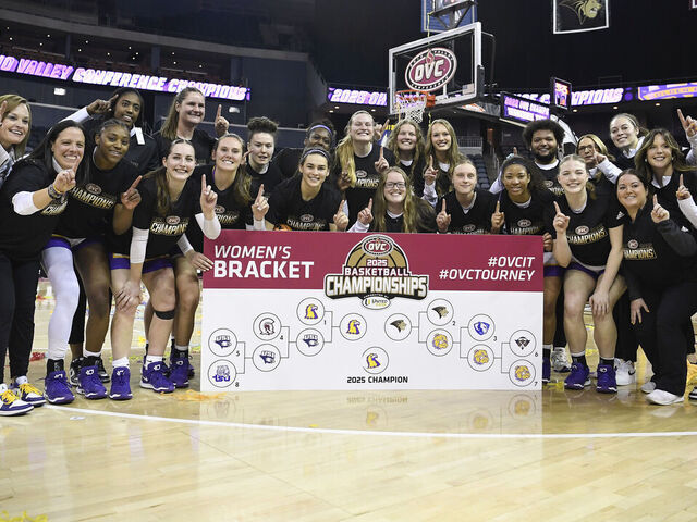 EVANSVILLE, IN - MARCH 08: The Tennessee Tech Golden Eagles pose for a photo after sticking their logo on the 2025 Champion circle on the OVC bracket after winning the Ohio Valley Conference Women's Basketball Tournament championship game between the Tennessee Tech Golden Eagles and the Lindenwood Lions on March 8, 2025, at the Ford Center in Evansville, Indiana.