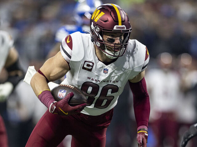 DETROIT, MICHIGAN - JANUARY 18: Zach Ertz #86 of the Washington Commanders runs with the ball during an NFL Football game against the Detroit Lions at Ford Field on January 18, 2025 in Detroit, Michigan.