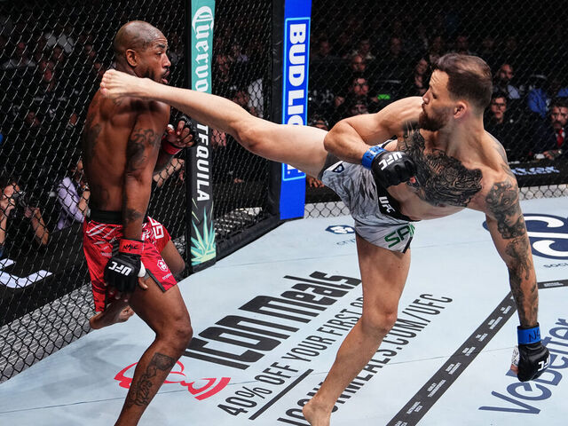 LAS VEGAS, NEVADA - MARCH 08: (R-L) Mauricio Ruffy of Brazil kicks King Green in a lightweight fight during the UFC 313 event at T-Mobile Arena on March 08, 2025 in Las Vegas, Nevada.