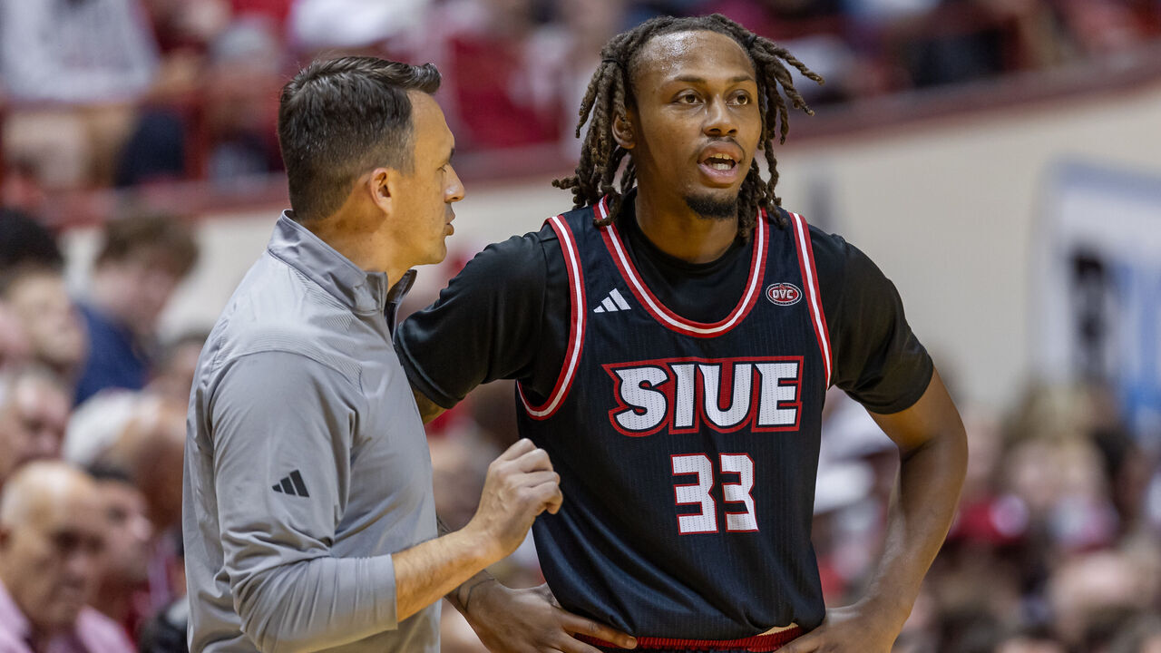BLOOMINGTON, INDIANA - NOVEMBER 6: Head coach Brian Barone talks with Jo Valrie #33 of the SIU Edwardsville Cougars during the game against the Indiana Hoosiers at Simon Skjodt Assembly Hall on November 6, 2024 in Bloomington, Indiana.