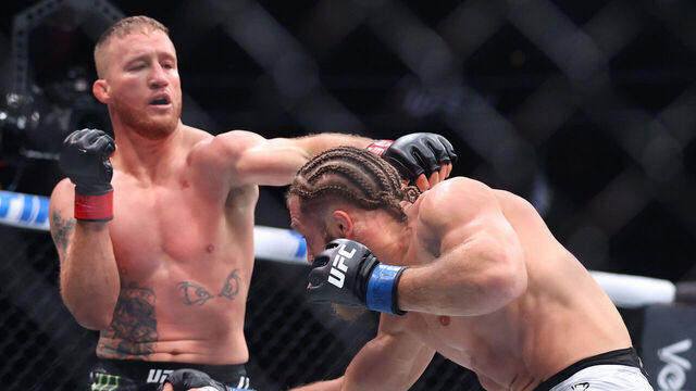 LAS VEGAS, NEVADA - MARCH 08: Justin Gaethje of the United States (L) fights Rafael Fiziev of Azerbaijan in a lightweight bout during UFC 313 at T-Mobile Arena on March 08, 2025 in Las Vegas, Nevada.