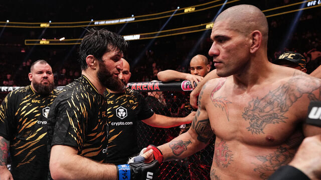 LAS VEGAS, NEVADA - MARCH 08: (L-R) Magomed Ankalaev of Russia talks to Alex Pereira of Brazil at the end of the UFC light heavyweight championship fight during the UFC 313 event at T-Mobile Arena on March 08, 2025 in Las Vegas, Nevada.