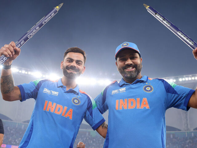 DUBAI, UNITED ARAB EMIRATES - MARCH 09: Virat Kohli of India and teammate Rohit Sharma celebrate following the team's victory in the ICC Champions Trophy 2025 Final between India and New Zealand at Dubai International Stadium on March 09, 2025 in Dubai, United Arab Emirates.