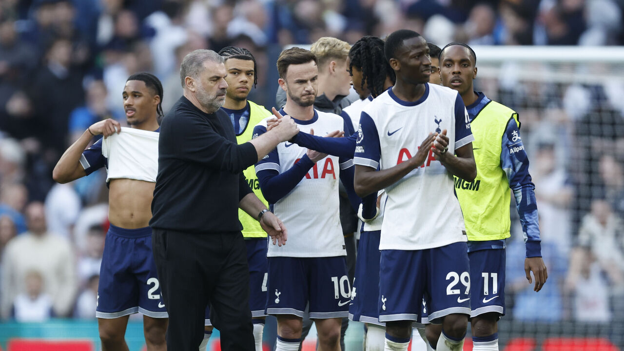 LONDON, ENGLAND - MARCH 9: Ange Postecoglou, Manager of Tottenham Hotspur, James Maddison of Tottenham Hotspur, Pape Matar Sarr of Tottenham Hotspur and Mathys Tell of Tottenham Hotspur on the pitch after the Premier League match between Tottenham Hotspur FC and AFC Bournemouth at Tottenham Hotspur Stadium on March 9, 2025 in London, England.