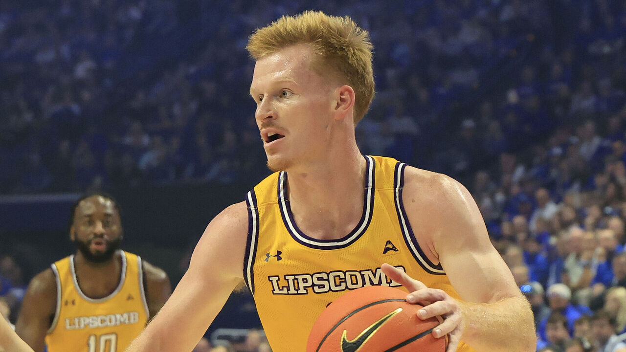 LEXINGTON, KENTUCKY - NOVEMBER 19: Will Pruitt #2 of the Lipscomb Bisons takes a shot over Koby Brea #4 of the Kentucky Wildcats during the first half at Rupp Arena on November 19, 2024 in Lexington, Kentucky.