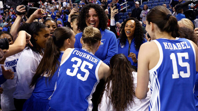 GREENSBORO, NORTH CAROLINA - MARCH 9: Head coach Kara Lawson of the Duke Blue Devils celebrates with her team following their victory against the NC State Wolfpack in the championship game of the ACC women's basketball tournament at First Horizon Coliseum on March 9, 2025 in Greensboro, North Carolina.