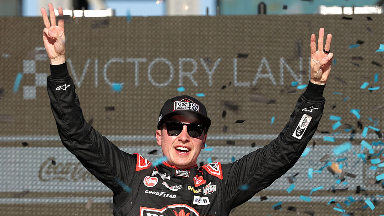 AVONDALE, ARIZONA - MARCH 09: Christopher Bell, driver of the #20 Reser's Fine Foods Toyota, celebrates in victory lane after winning the NASCAR Cup Series Shriners Children's 500 at Phoenix Raceway on March 09, 2025 in Avondale, Arizona.