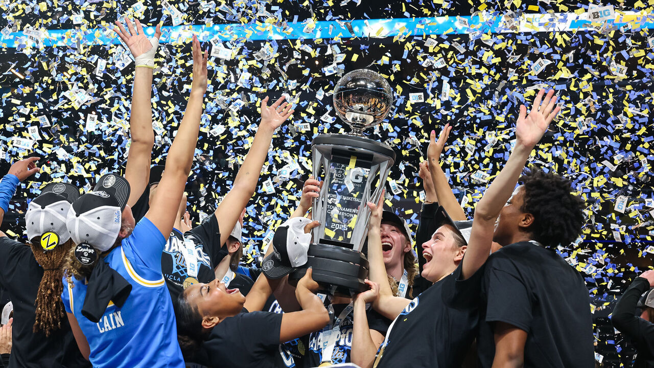 INDIANAPOLIS, INDIANA - MARCH 9: Members of the UCLA Bruins celebrate following the game against the USC Trojans in the Big Ten Women's Basketball Tournament championship game at Gainbridge Fieldhouse on March 9, 2025 in Indianapolis, Indiana.