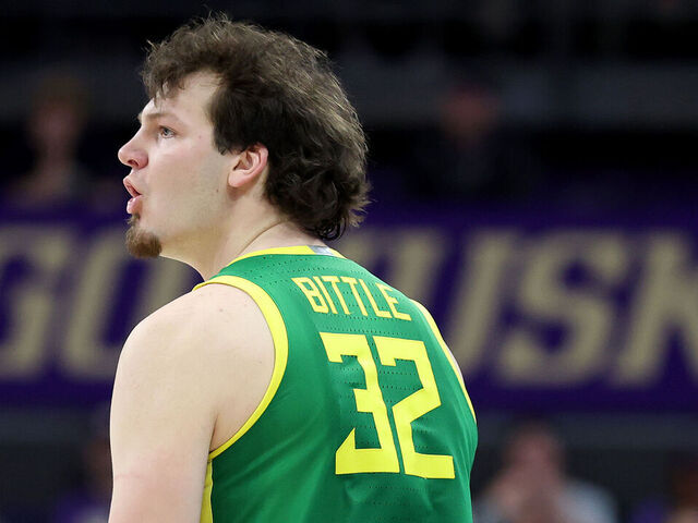 SEATTLE, WASHINGTON - MARCH 09: Nate Bittle #32 of the Oregon Ducks reacts after his three point basket against the Washington Huskies during the second half at Alaska Airlines Arena on March 09, 2025 in Seattle, Washington.